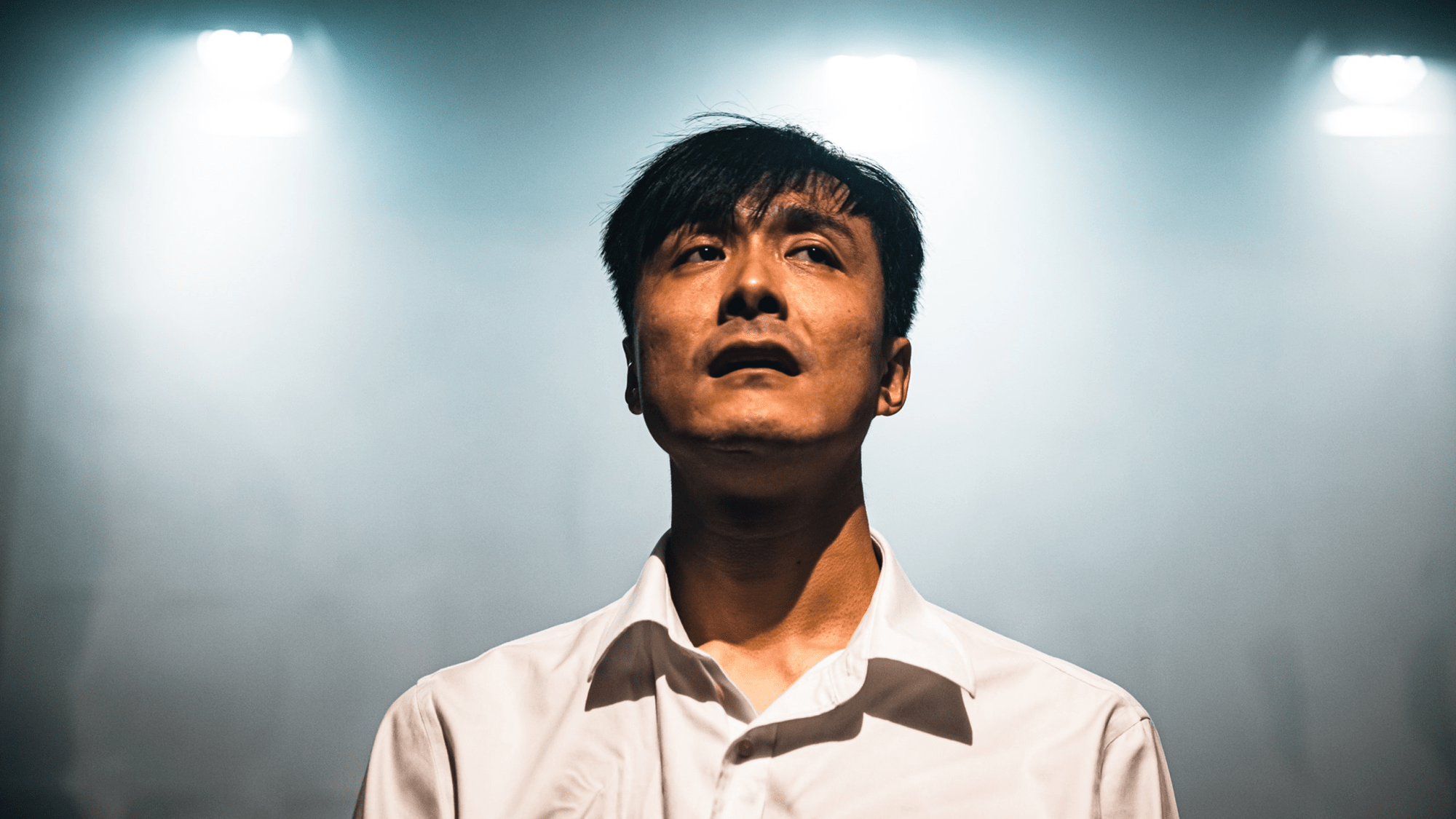 Theatre maker Wang Chong, photographed from below. 